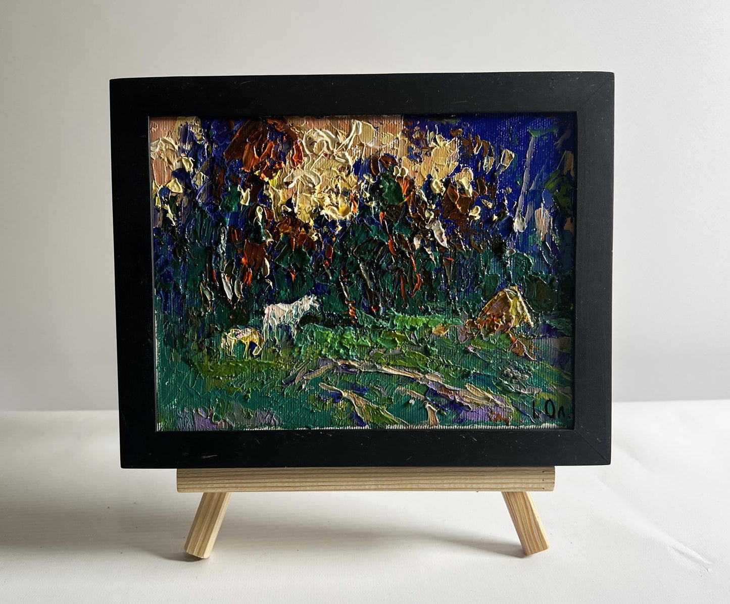 Oil painting of yellow sunset behind tree branches by Oleksiy Ivanyuk