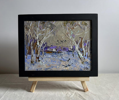 Oil painting Snowy path to the village by Oleksiy Ivanyuk, snowy textured landscape in black frame