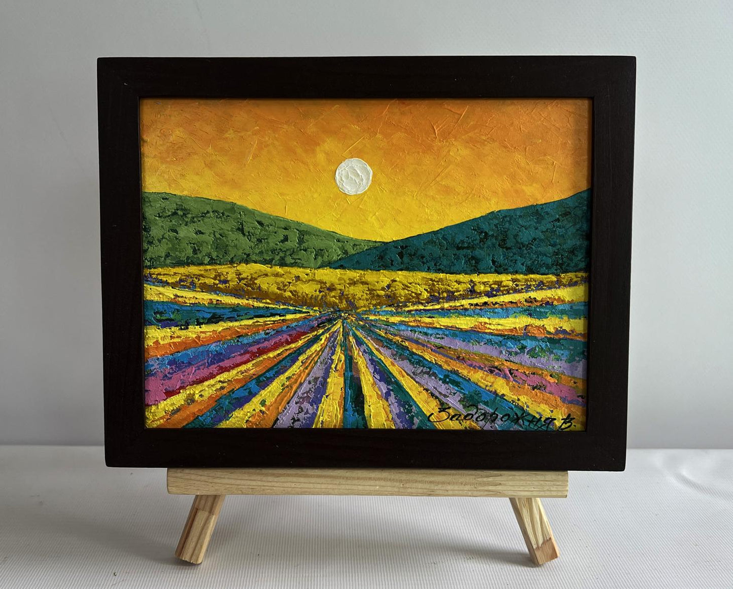 Oil painting A fleeting memory of sunset by V. Zadorozhnya on easel
