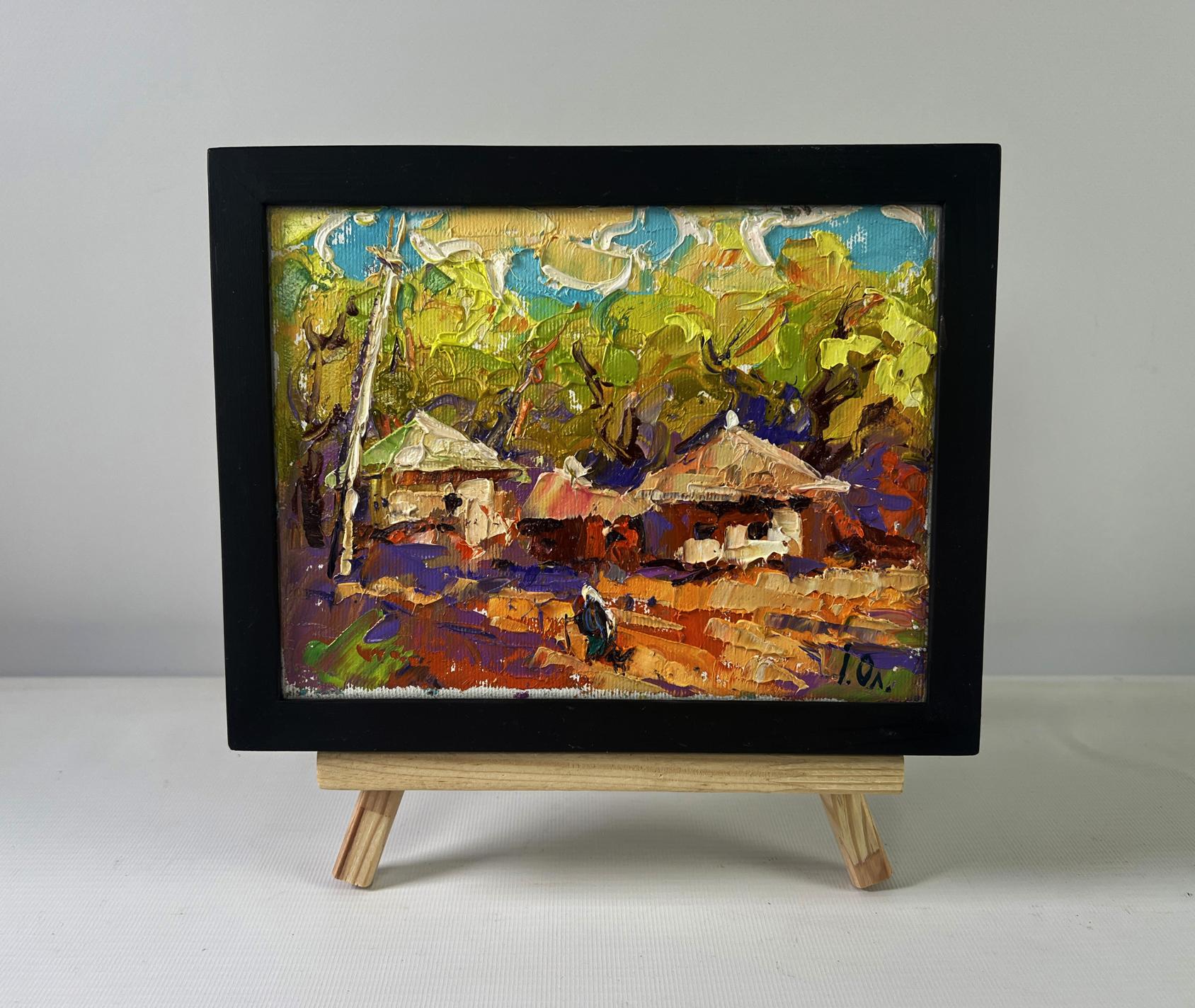 Oil painting by Oleksiy Ivanyuk: warm evening sunset over colorful village
