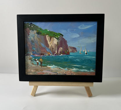 Black-framed oil painting Sea with ships by Yuriy Suprunchuk