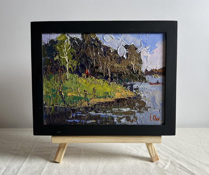 Oil painting By boat to the shore by Oleksiy Ivanyuk, lush green landscape
