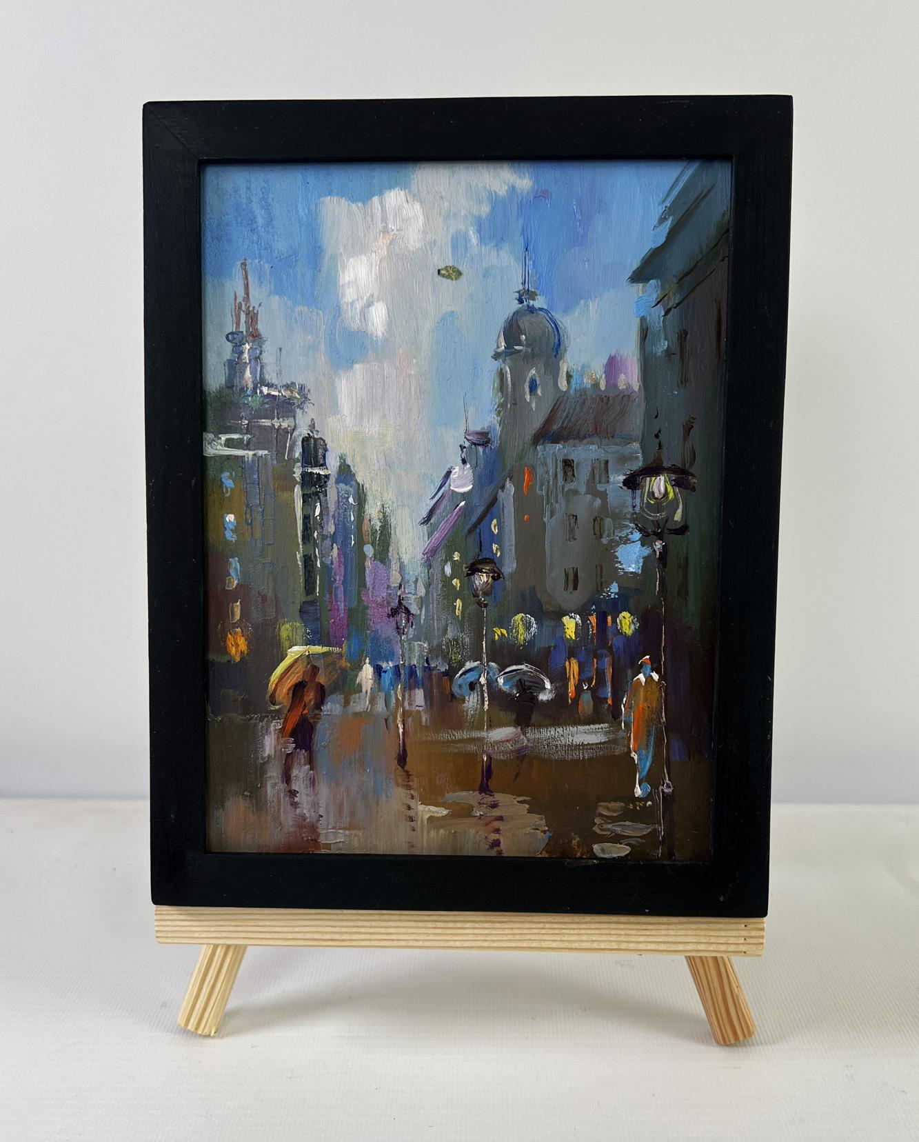 Framed impressionist oil painting of rainy city street by Yuriy Suprunchuk