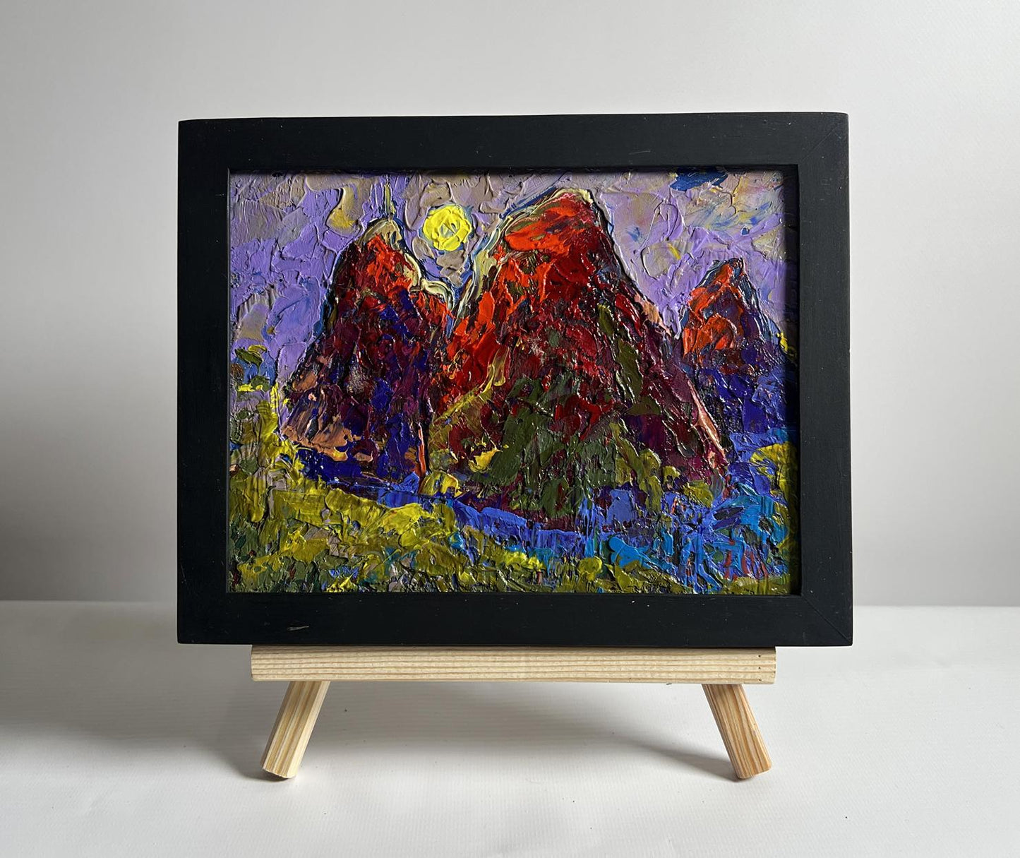 Oil painting of moonlit field by Oleksiy Ivanyuk, vibrant red purple mountains