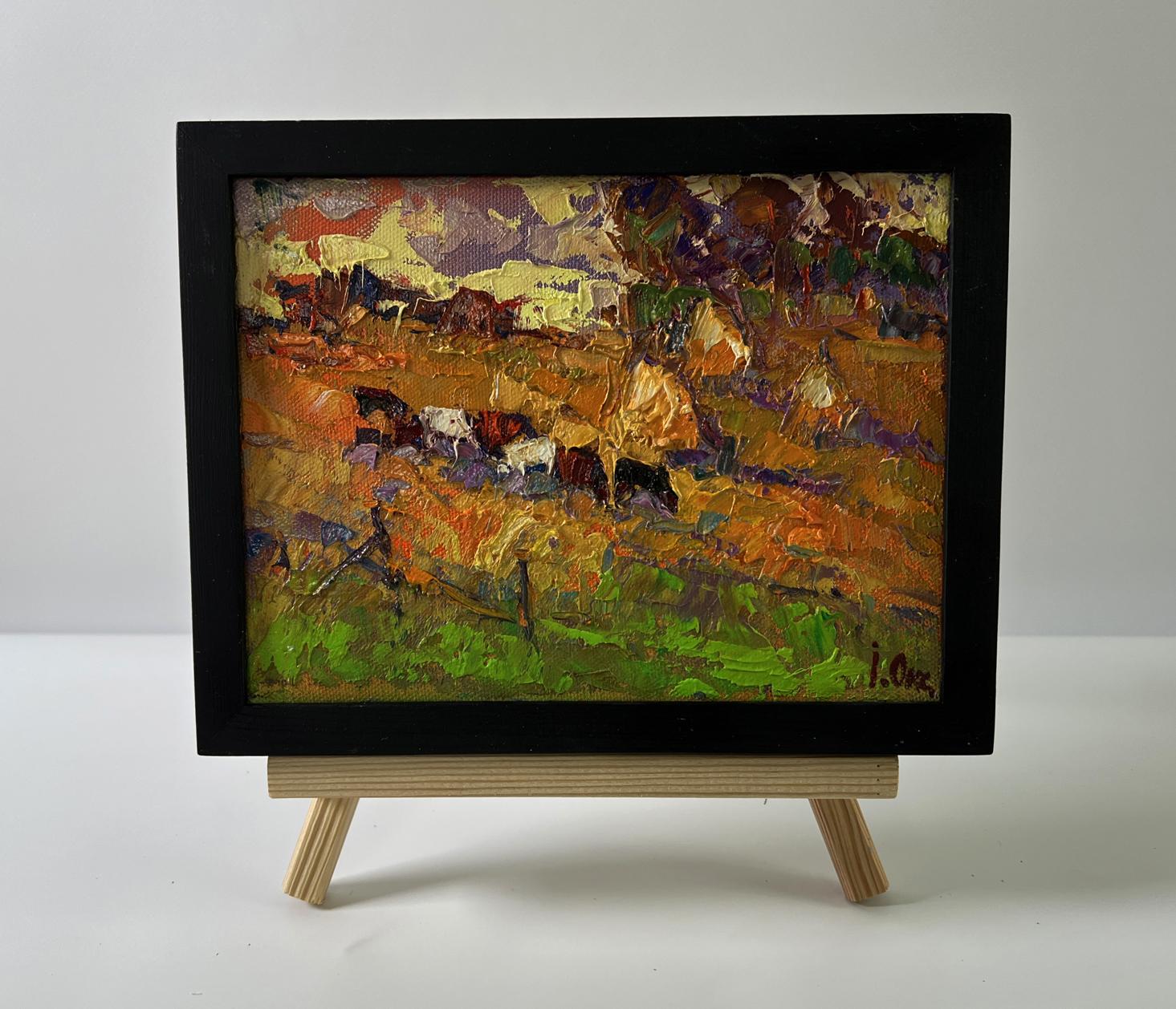 Oil painting Autumn evening by Oksana Ivanyuk with cows in orange field