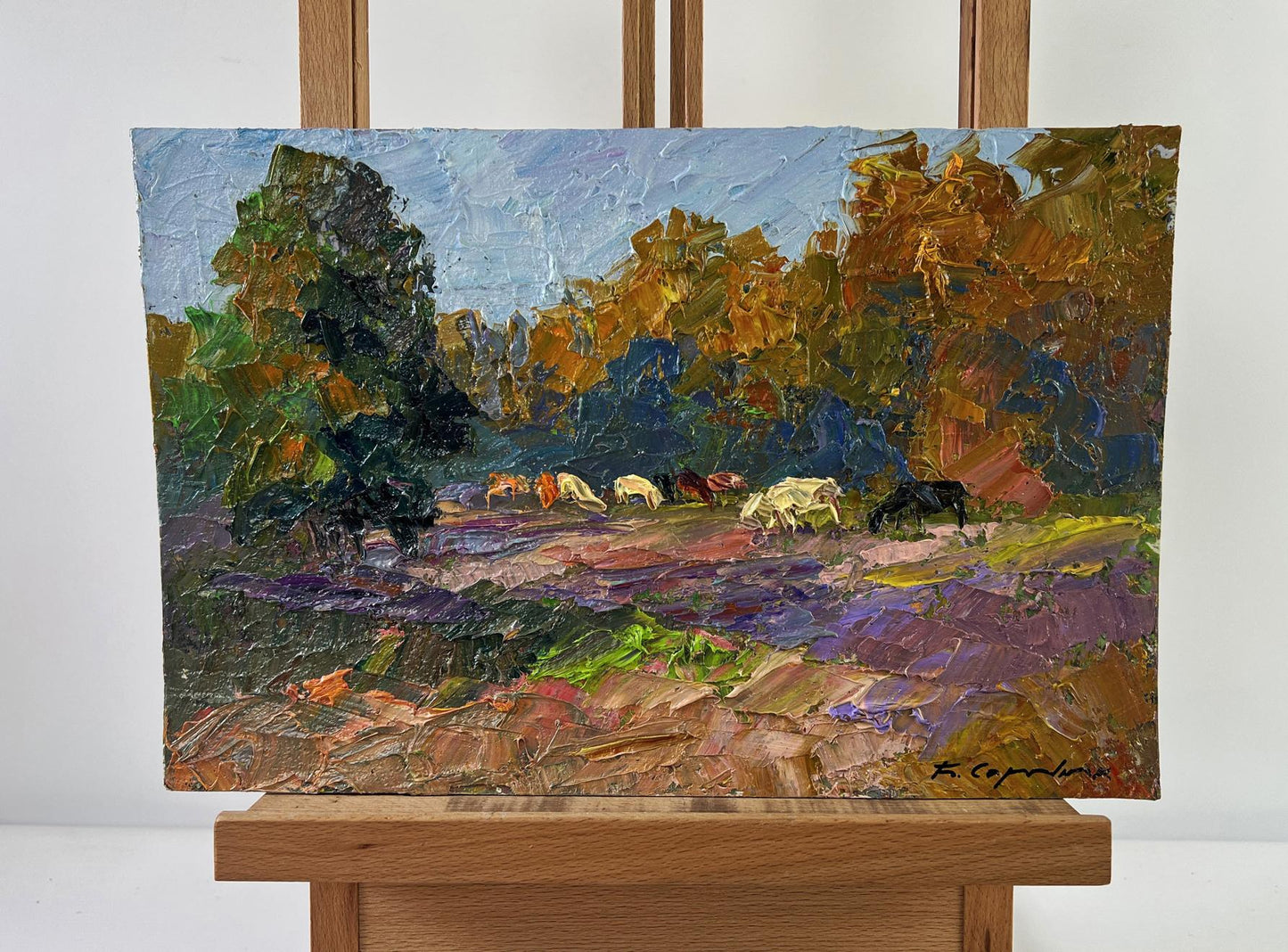 Oil painting of cows grazing by Boris Serdyuk