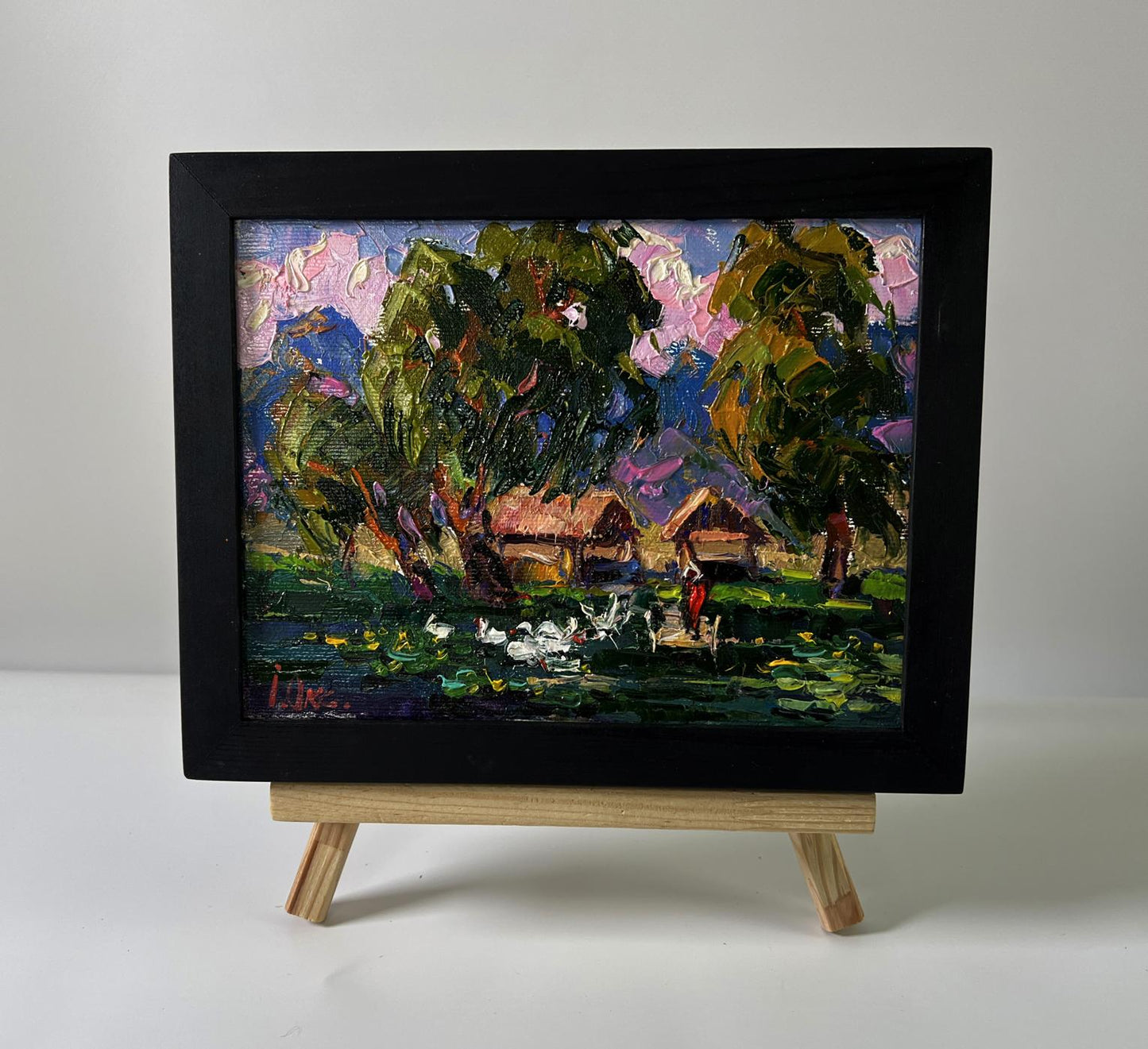 Oil painting Geese in a village lake by Oksana Ivanyuk with lush trees and vibrant skies