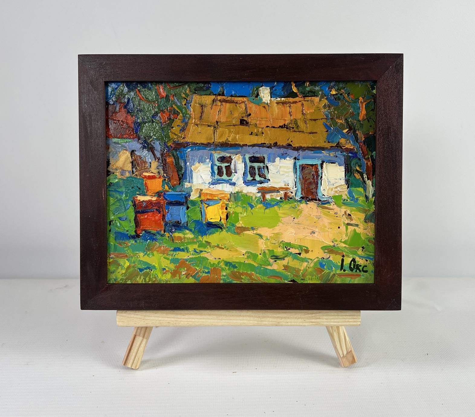 Oil painting of rustic cottage with beehives by Oksana Ivanyuk