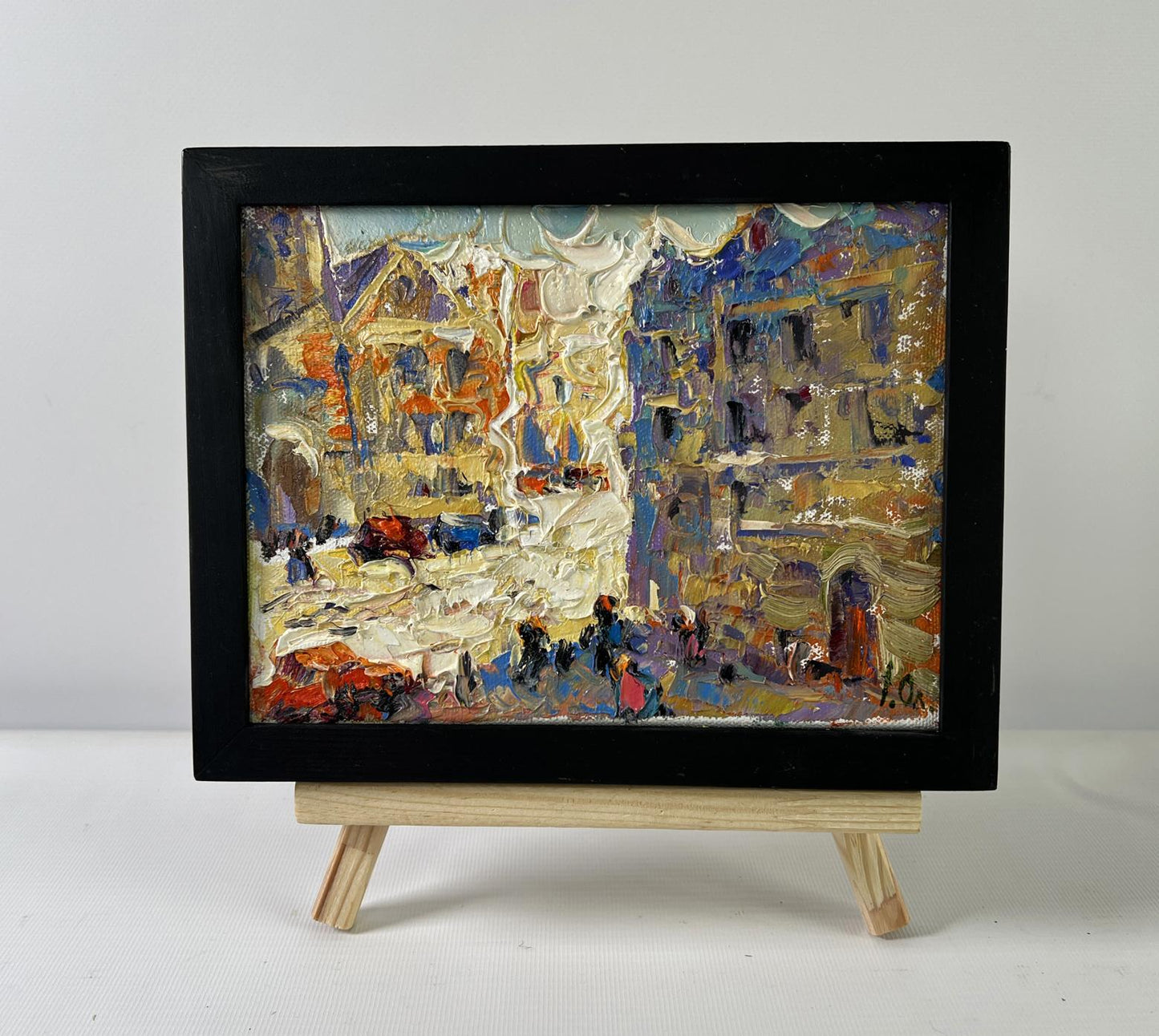 Oil painting Twilight Over the City by Oleksiy Ivanyuk in black frame