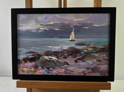 Framed oil painting of sailboat on turbulent blue waves by Yuriy Suprunchuk