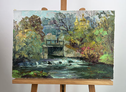 Oil painting Morning rays by Boris Serdyuk: river, trees, stone bridge, golden domes