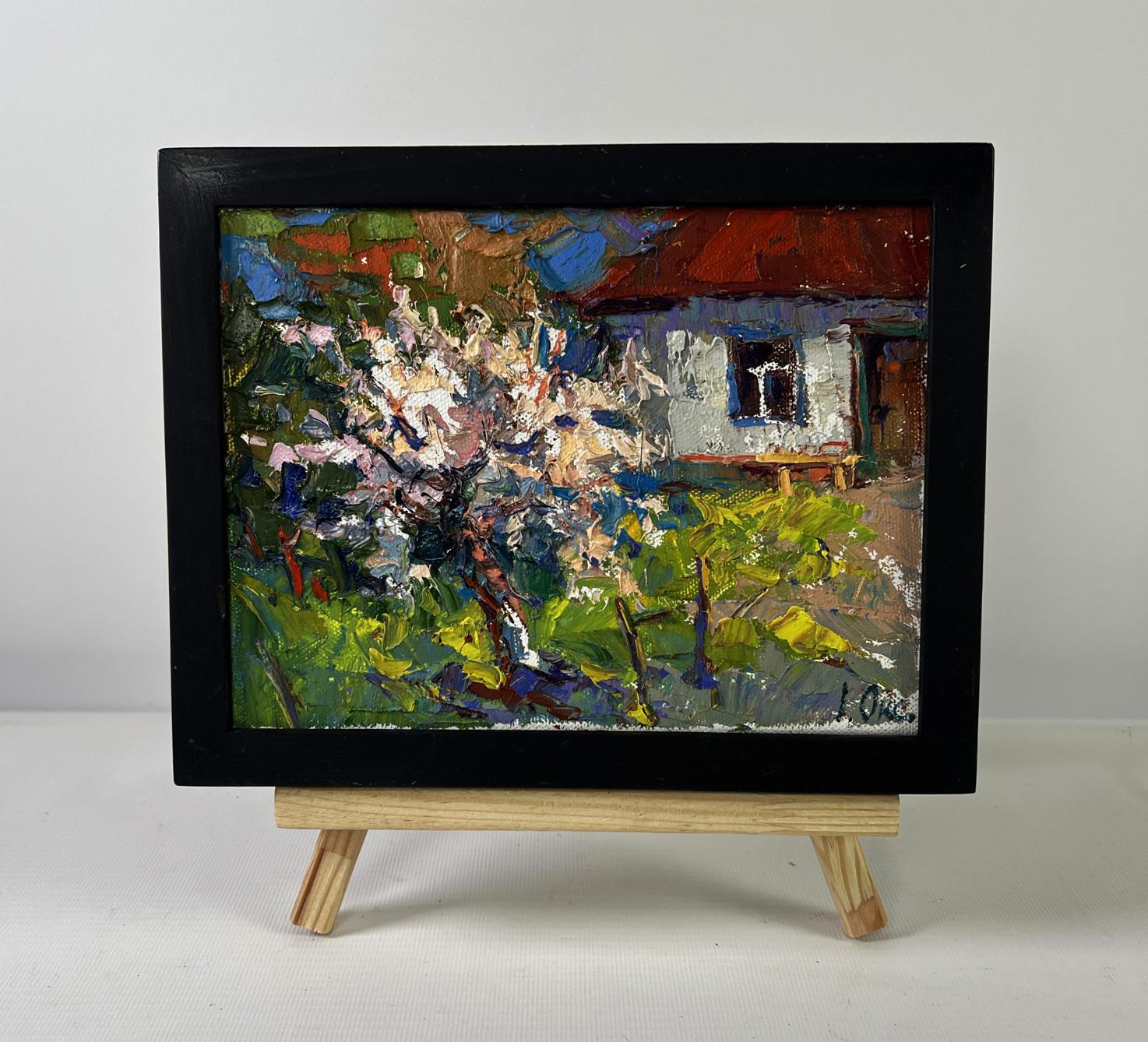 Vibrant impressionist oil painting Petals under the warm spring sun by Oksana Ivanyuk on wooden easel