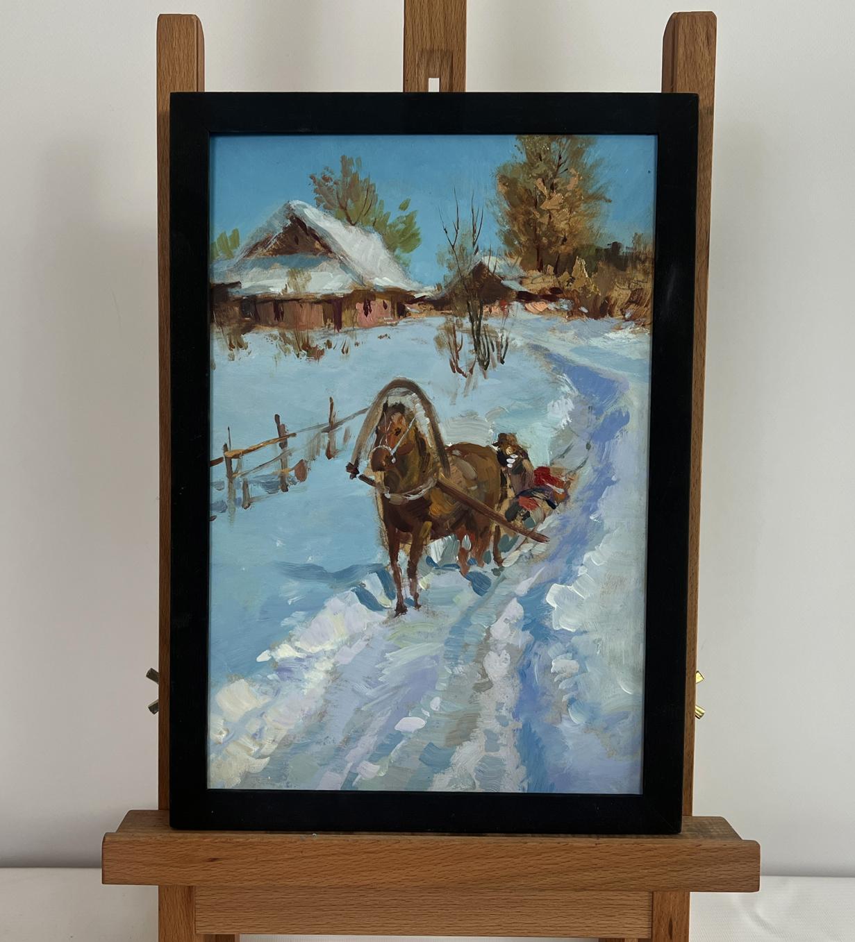 Framed oil painting of horse-drawn sleigh in snowy scene by Yuriy Suprunchuk