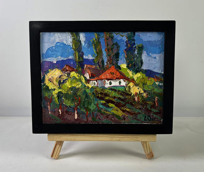 Oil painting Childhood in the aromas of grass by Oksana Ivanyuk in black frame