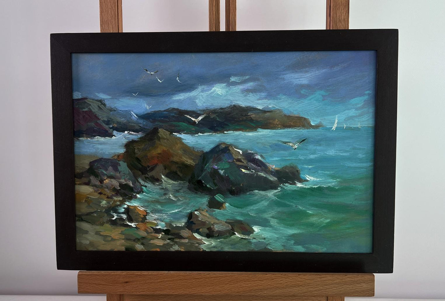Framed oil painting of approaching sea storm by Yuriy Suprunchuk