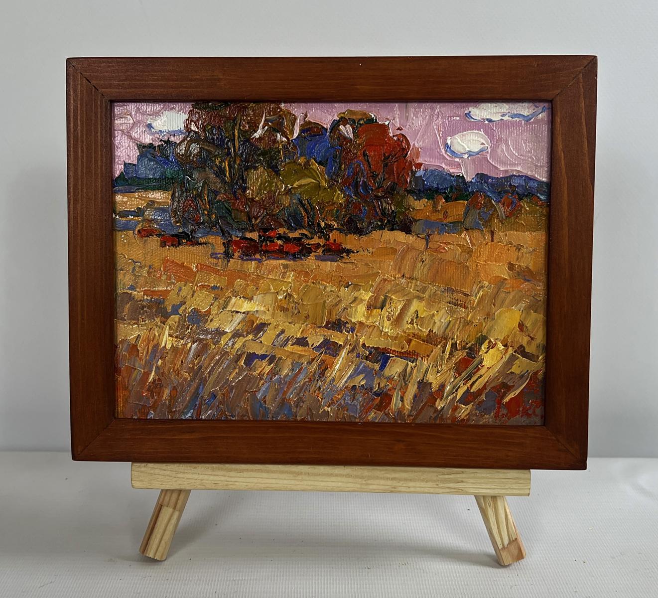 Oil painting On the autumn steppes by Oksana Ivanyuk, golden fields under pink sky