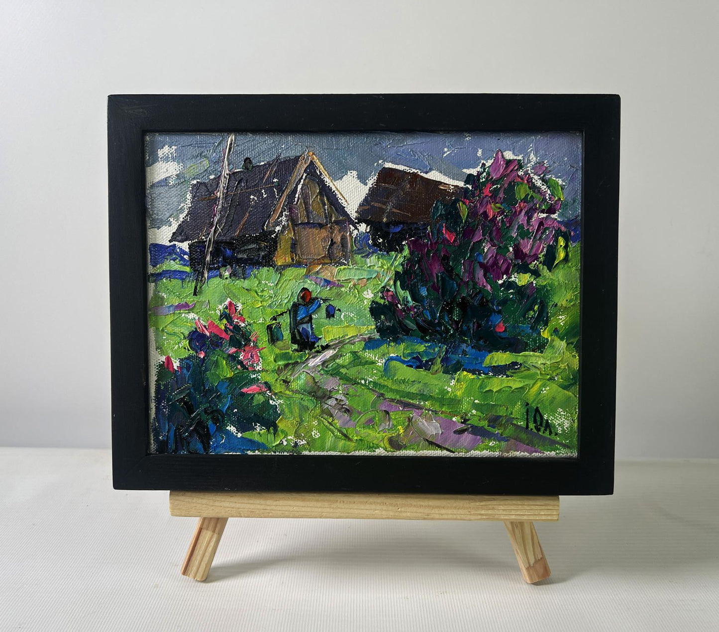 Vibrant impressionist oil painting by Oleksiy Ivanyuk: cool evening rural scene in black frame