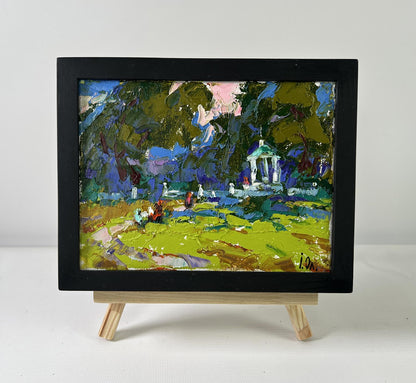 Oil painting A Walk in the Park by Oleksiy Ivanyuk in black frame