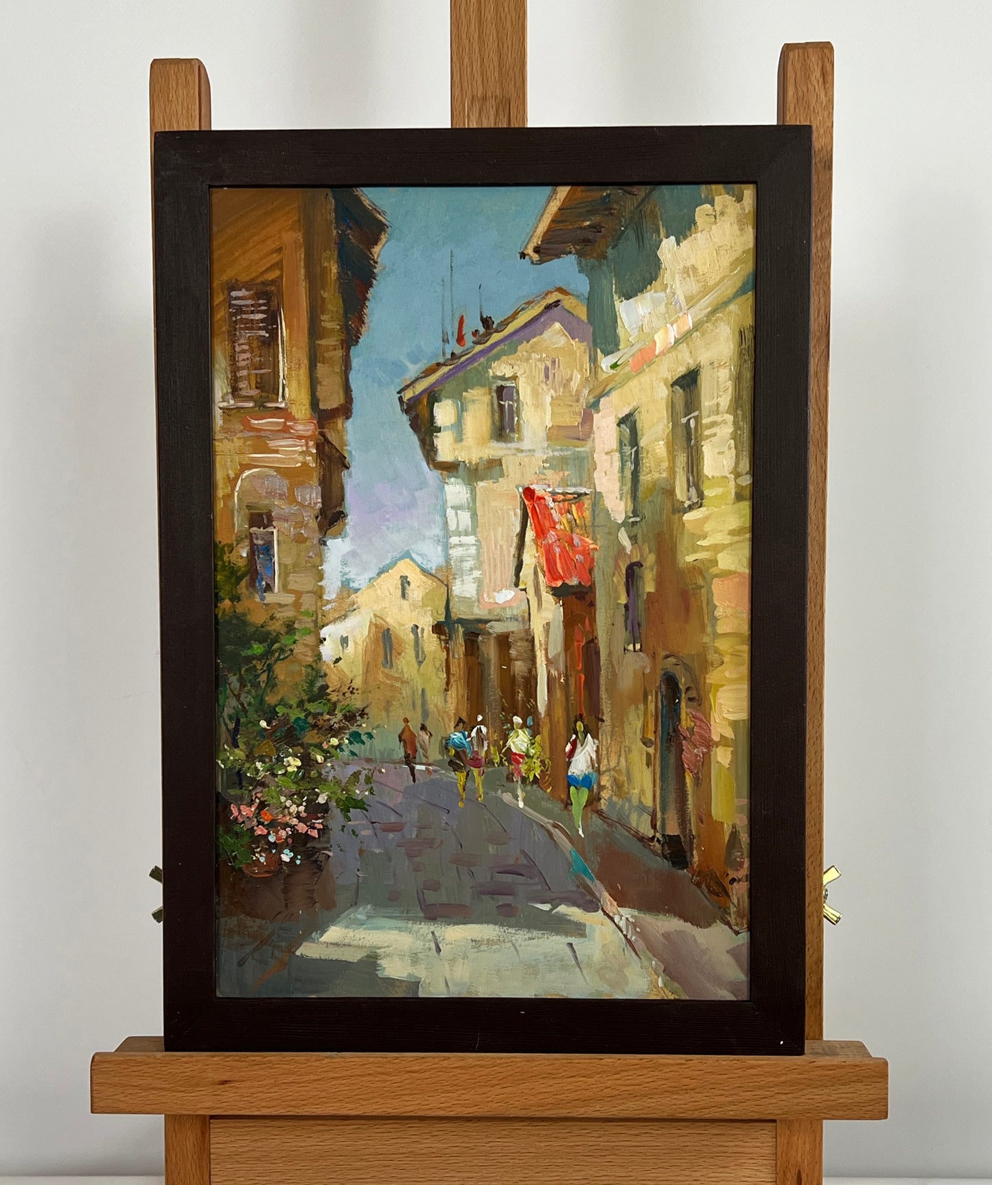 Framed oil painting Summer walk around the city by Yuriy Suprunchuk