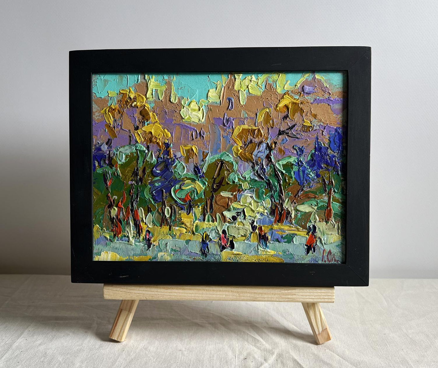 Oil painting Morning bustle of the city by Oleksiy Ivanyuk in black frame