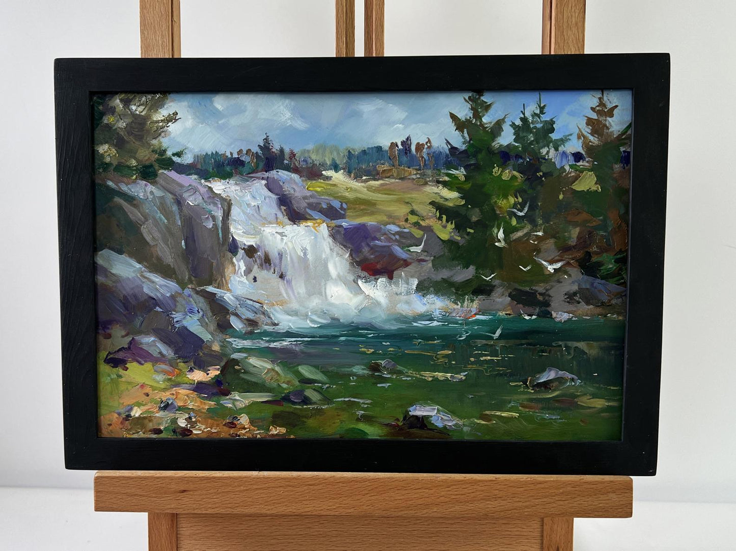Black-framed oil painting of Mountain waterfall by Yuriy Suprunchuk