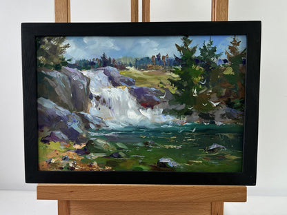 Black-framed oil painting of Mountain waterfall by Yuriy Suprunchuk