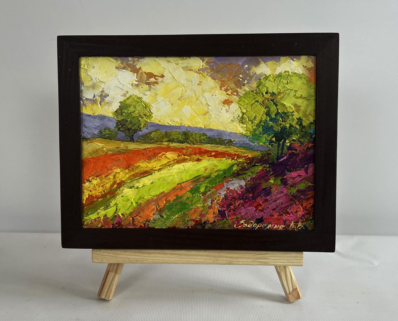 Oil painting of flower meadows in sunset rays by V. Zadorozhnya
