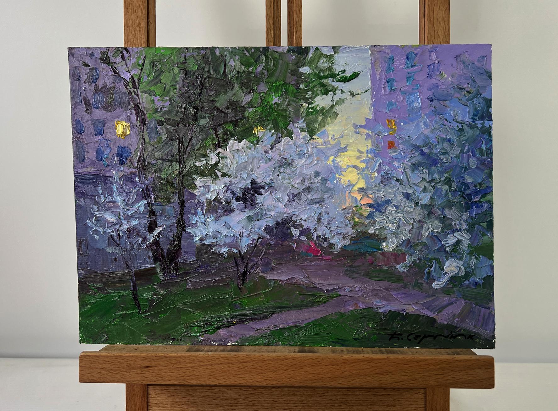 Oil painting Spring evening city mood by Boris Serdyuk: garden with blossoms