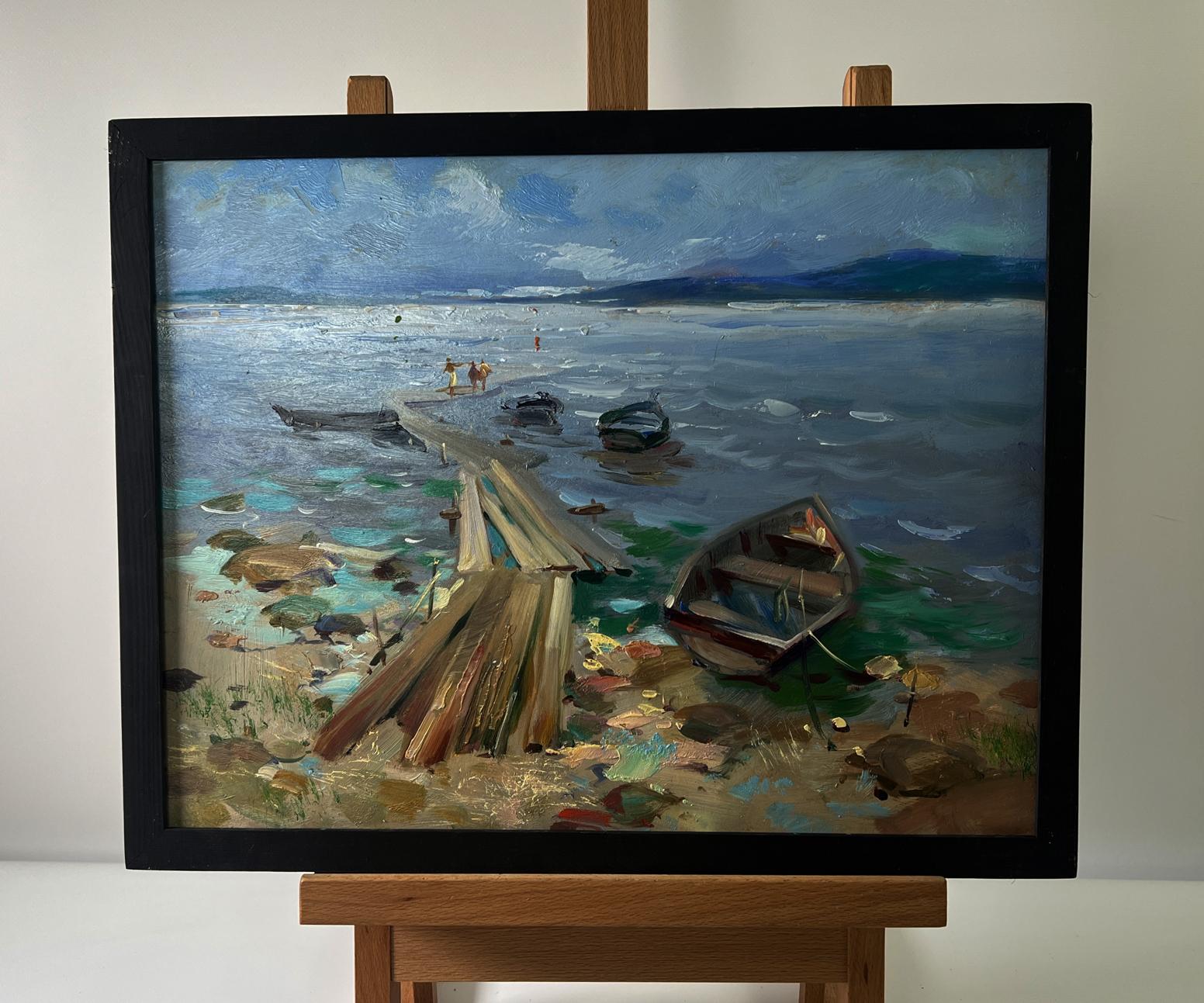 Oil painting of boats on river bank by Yuriy Suprunchuk