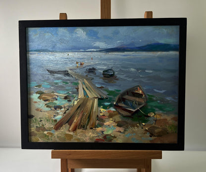 Oil painting of boats on river bank by Yuriy Suprunchuk