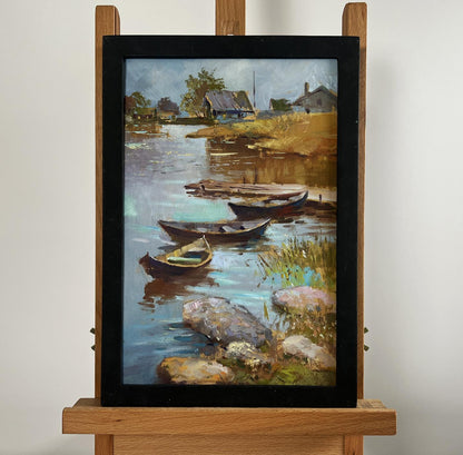 Framed oil painting of Yuriy Suprunchuk village boat port riverside scene