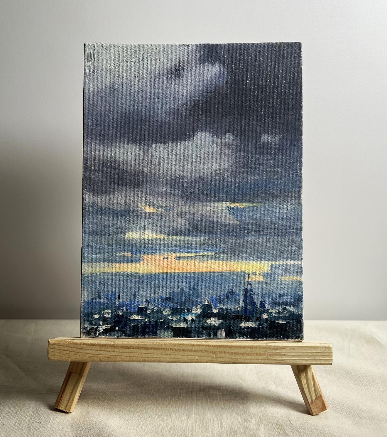 Oil painting Yellow sunset over the city by Tatyana Derdey moody cityscape