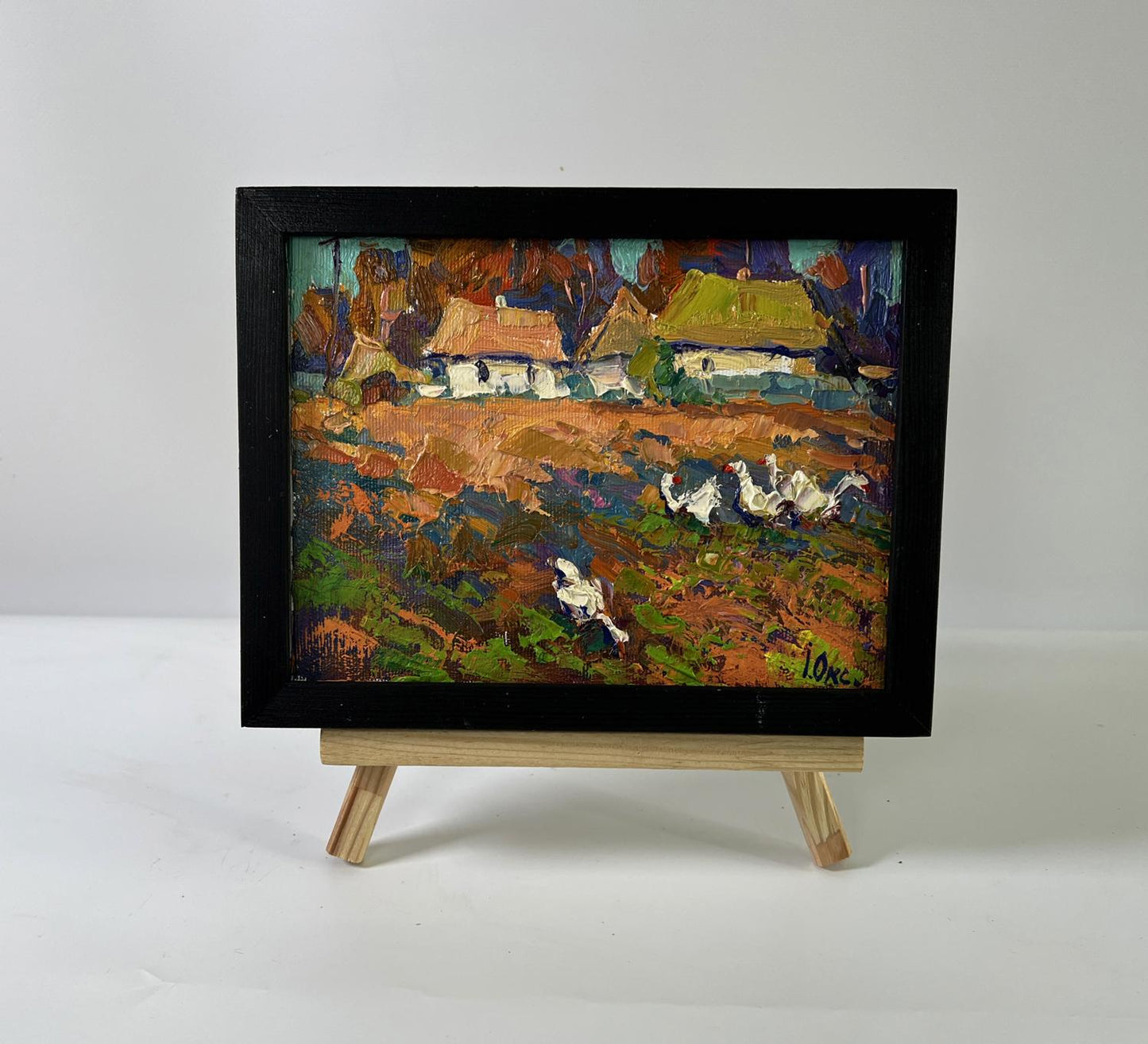 Vibrant impressionist oil painting of geese in rural village by Oksana Ivanyuk, black frame