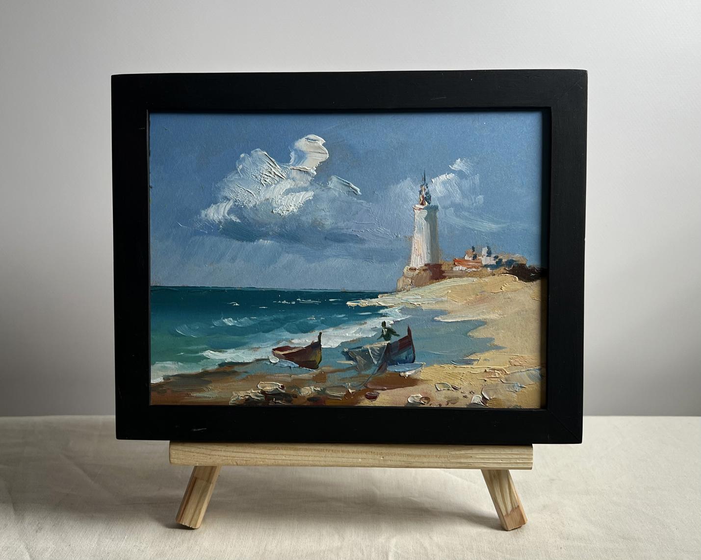 Framed oil painting by Yuriy Suprunchuk: boats at lighthouse coastal scene