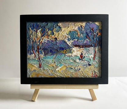Oil painting Evening on the edge of the village by Oleksiy Ivanyuk, textured winter landscape in black frame