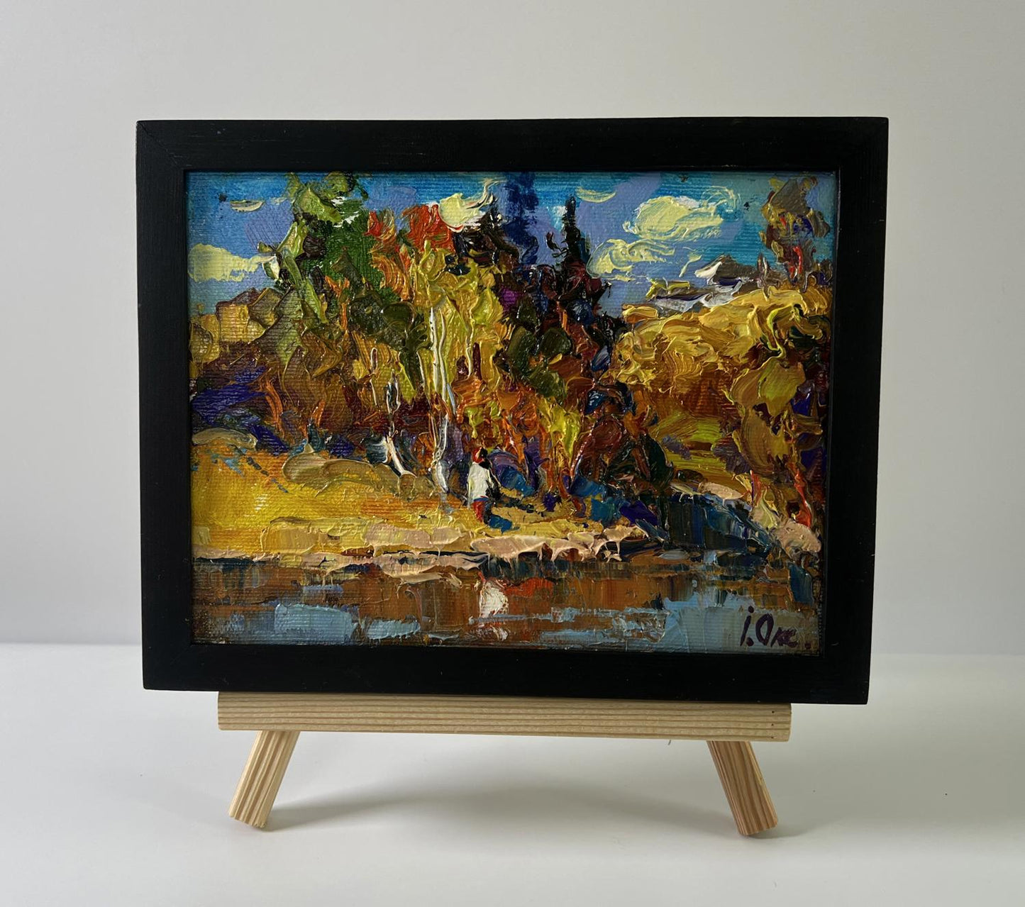 Oil painting Over the River by Oksana Ivanyuk in black frame