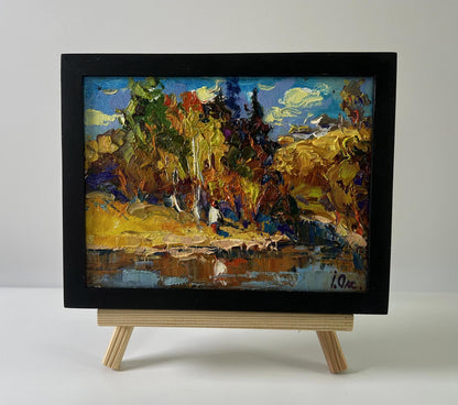 Oil painting Over the River by Oksana Ivanyuk in black frame