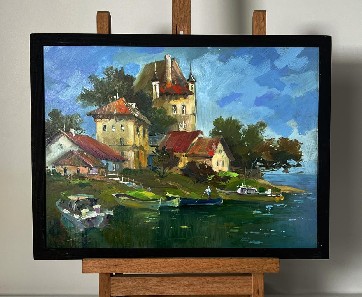 Framed oil painting of lakeside village boat dock by Yuriy Suprunchuk