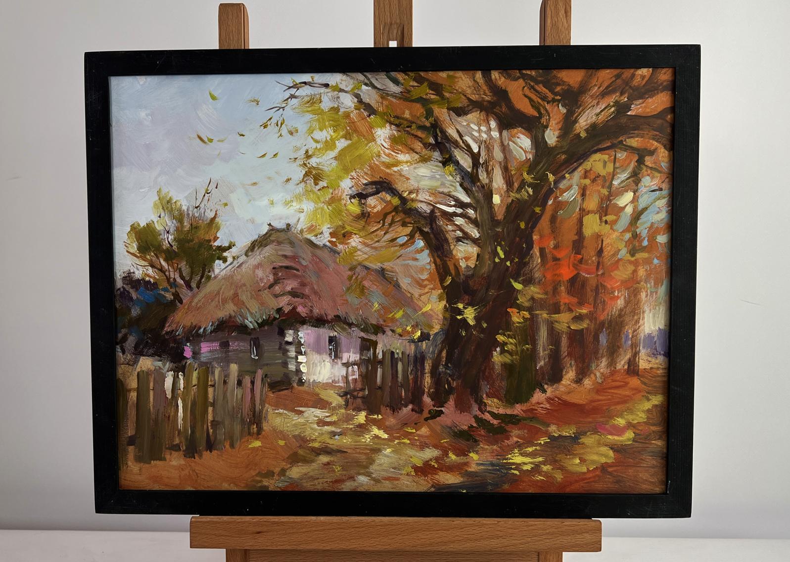 Oil painting of street in golden leaves by Yuriy Suprunchuk in black frame
