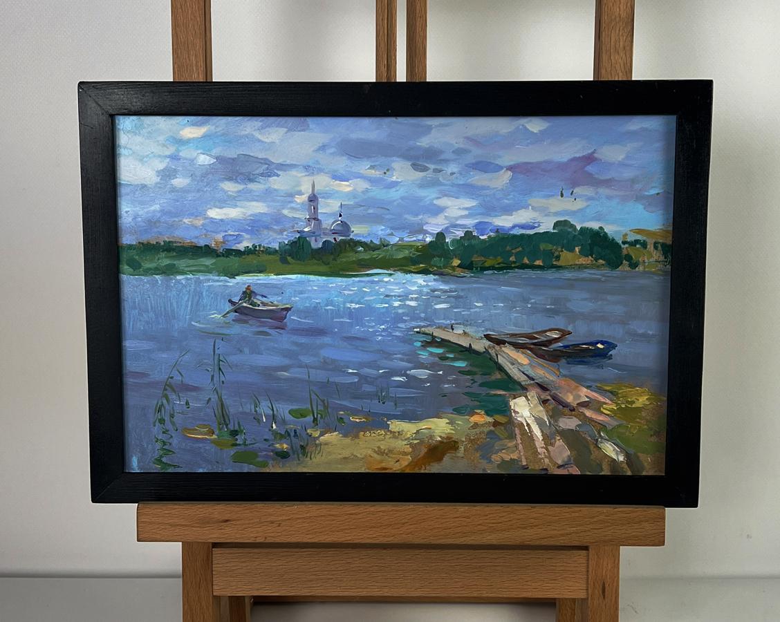 Black-framed oil painting of serene lakeside fishing by Yuriy Suprunchuk
