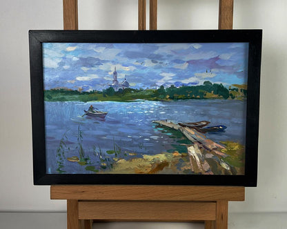 Black-framed oil painting of serene lakeside fishing by Yuriy Suprunchuk
