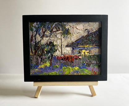 Oil painting Saturday night at home by Oksana Ivanyuk in black frame