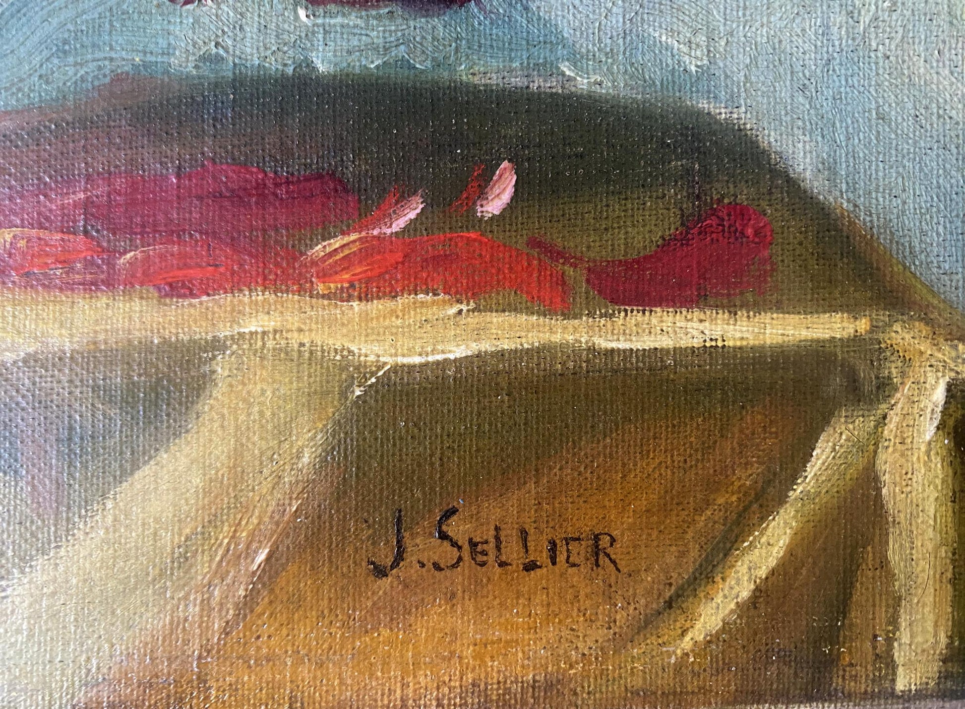 Oil painting of red flowers on draped golden fabric by J. Sellier