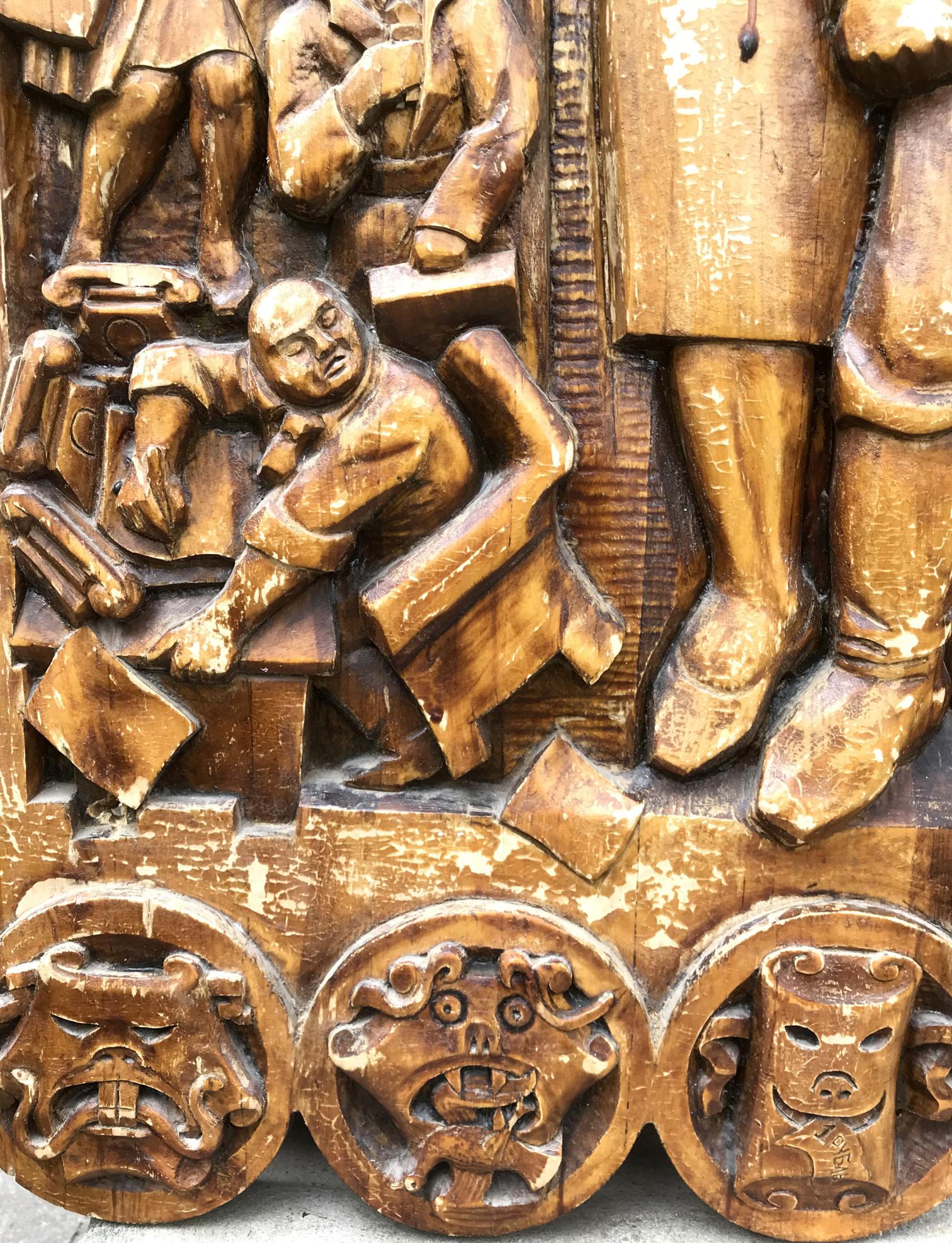 Detailed warm-toned wooden relief carving of social realism figures intransigent towards injustice