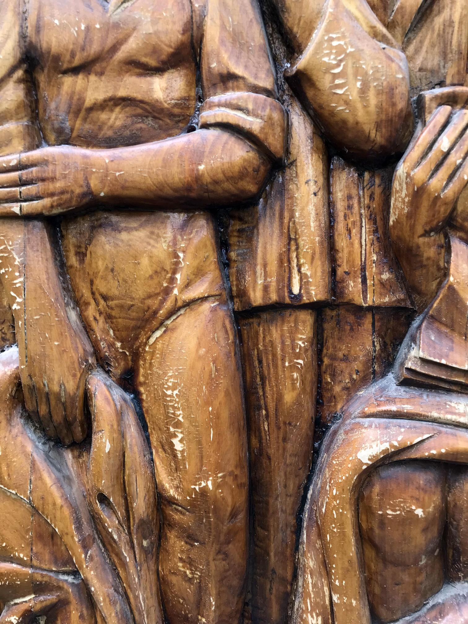 Social realism wooden relief of muscular figures in honesty and truthfulness