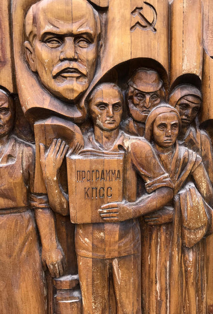 Social realism wooden relief: communist figure with Cyrillic book, hammer and sickle