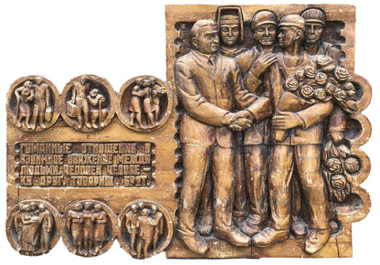 Bronze wooden relief of men in formal military attire holding roses, social realism panel