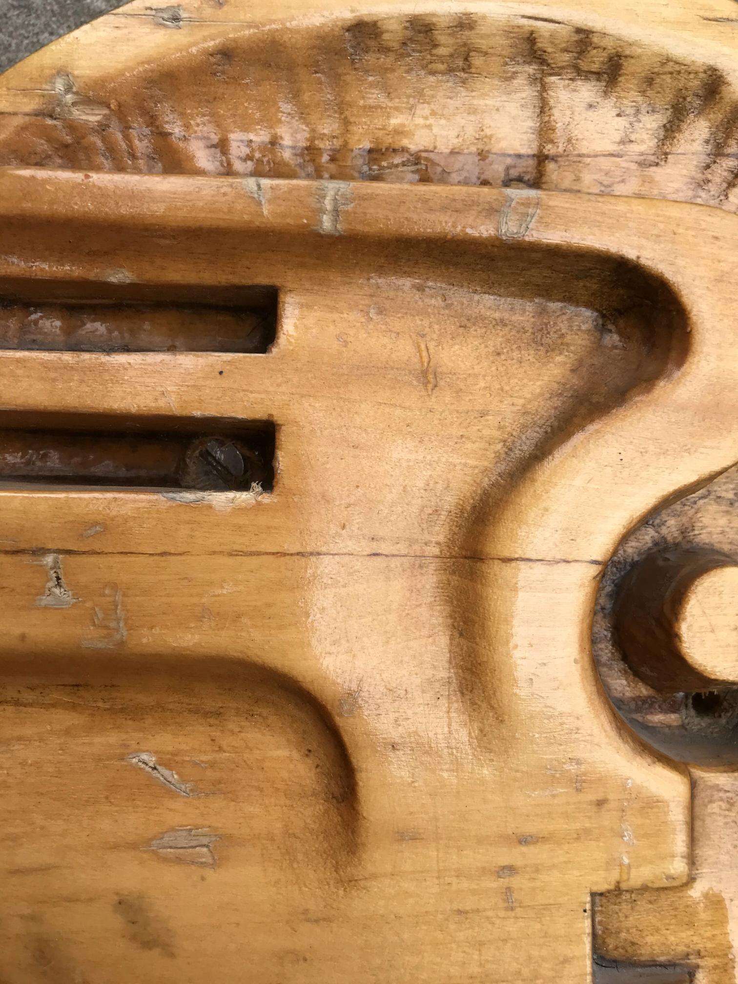 Social realism Dove of peace: worn wooden toy with carved grooves