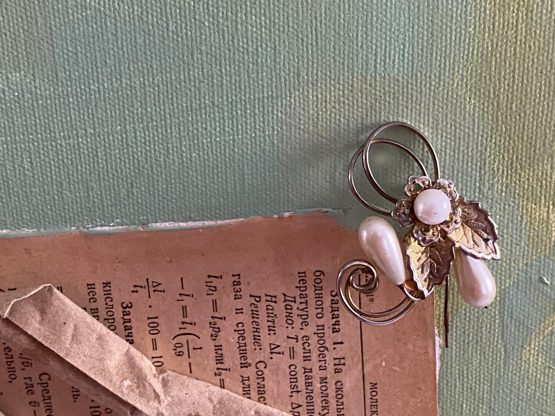Delicate silver brooch with pink pearl, leaf scrollwork, teardrop beads by Samchuk