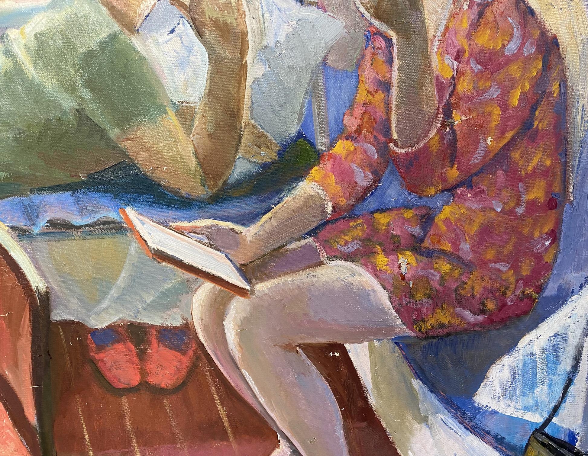 Oil painting by Khmelnitsky Alexander Anatolievich: woman in floral dress holds open book